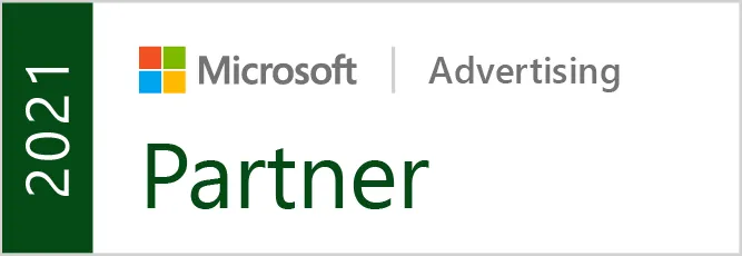 Microsoft Advertising Partner Logo 2021 mit Microsoft-Logo und grüner Schrift.